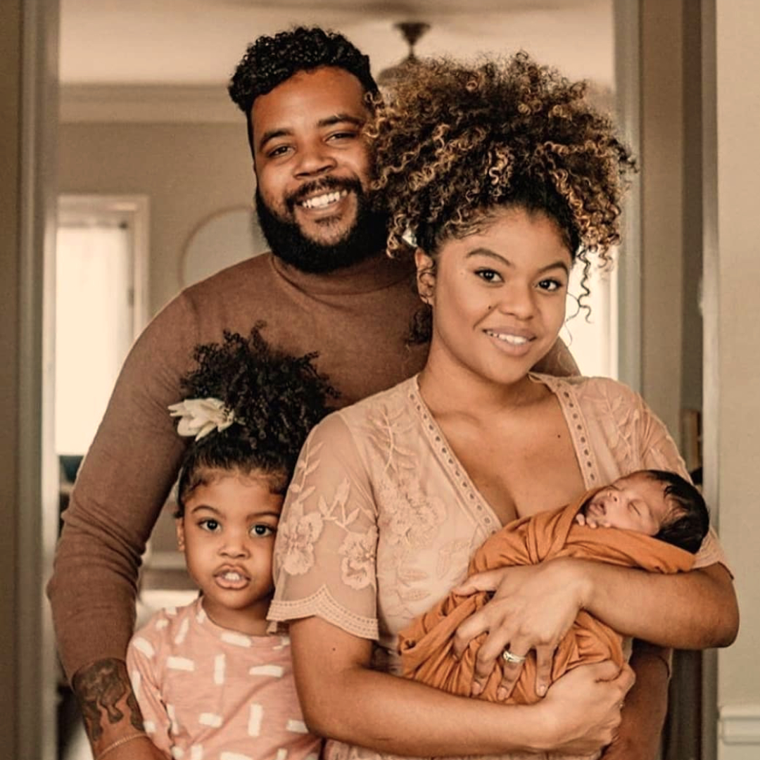 African American father and mother with their 2 kids